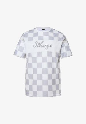 Korte mouw wit en lichtgrijs geruit overhemd met een gestructureerde stof en "Sthuge" in sierlijke letters op de borst geborduurd.