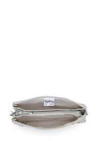 Kipling wallet, silver textured material, zip closure, two compartments, and logo tag inside. Features decorative stitching around edges.