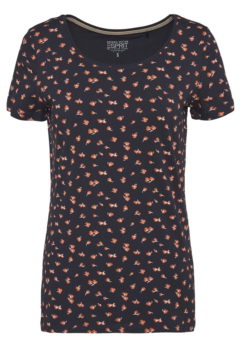 Námořnické tričko vyrobené z organické bavlny, s výstřihem do lodi a krátkými rukávy, zdobené malým květinovým potiskem v červené a bílé.