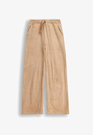 Beżowe spodnie z polaru z sznurkiem w talii, posiadające prosty krój nogawek oraz dwie boczne kieszenie zapewniające funkcjonalność. Miękka faktura.