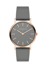 Runde Uhr mit einem grauen Zifferblatt und goldfarbenen Indizes. Verfügt über ein rosé-goldenes Gehäuse und ein glattes graues Silikonarmband. Einfaches, minimalistisches Design.