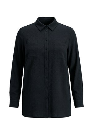 Černá košile s dlouhým rukávem a knoflíky, s texturovaným vzorem teček, klasickým límečkem a dvěma náprsními kapsami.