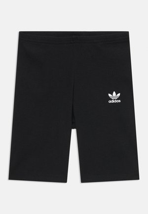 Svarte ribbestrikkede sykkelshorts laget av bomullsblanding, med et brodert hvitt Adidas-logo på venstre ben.