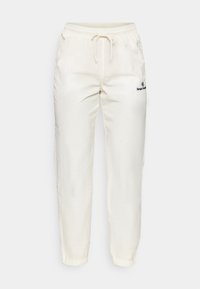 NAYLA PANTS - Tracksuit bottoms - gardenia/navy