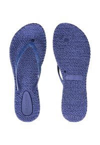 Infradito viola con suole testurizzate e cinturini glitterati, progettati con un motivo intrecciato e dettagli del marchio sulla soletta.