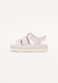 Lyserosa suede sandaler med tykke justerbare stropper, en polstret såle og en teksturert yttersåle. Minimalistisk design, uformell stil.