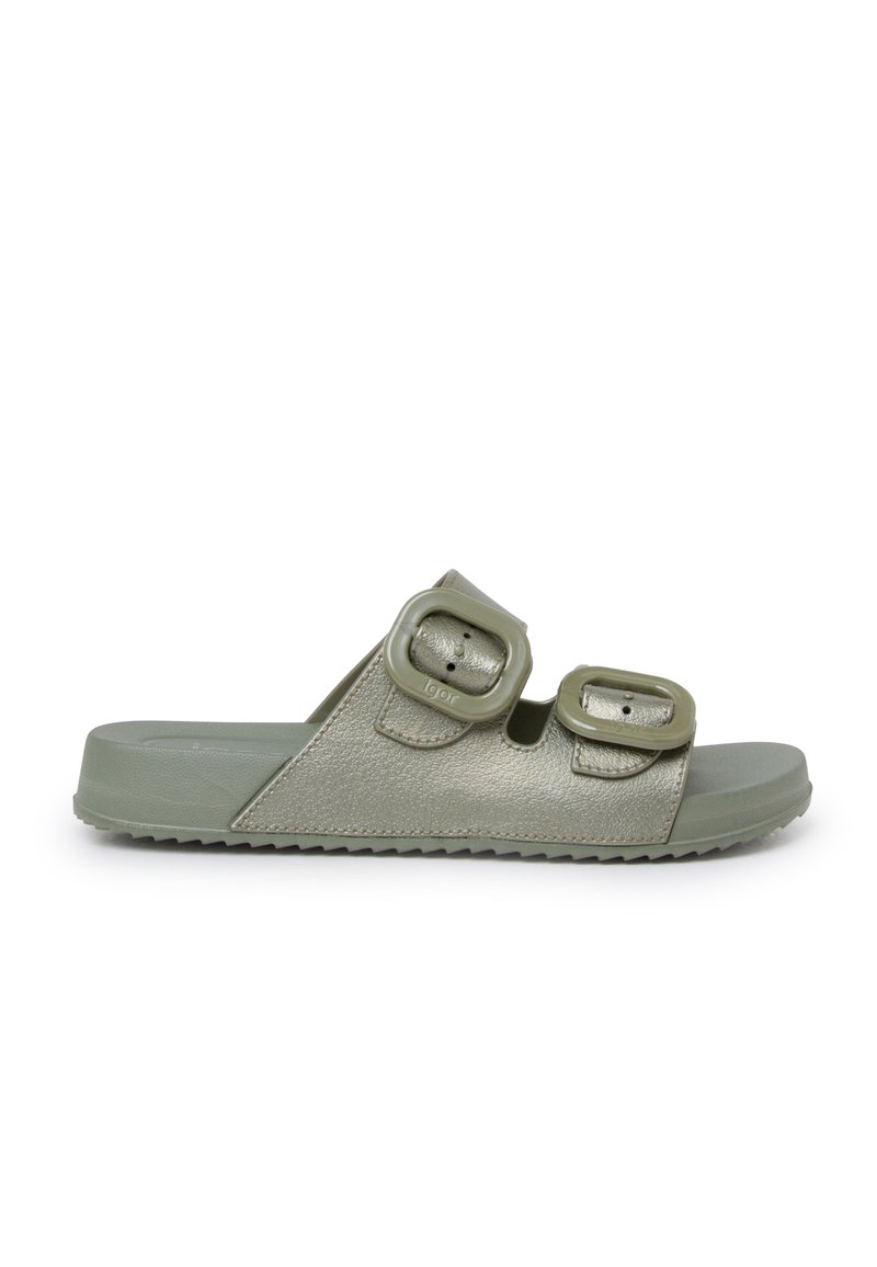 Green slide sandals with two buckle accents, crafted from textured synthetic material, featuring a flat sole and a grooved tread pattern.