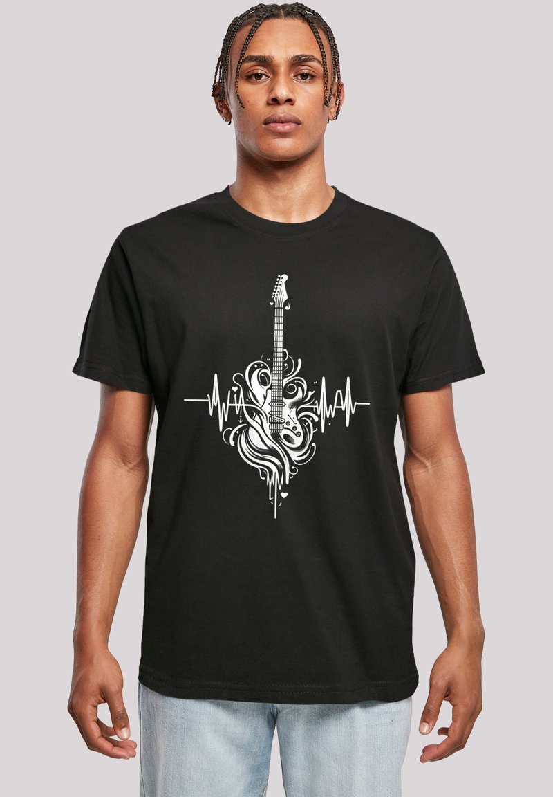 Black cotton t-shirt featuring a white graphic of an electric guitar surrounded by swirls and heartbeat lines, with detailed artwork and designs.