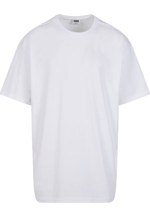 Witte katoenen T-shirt met korte mouwen, ronde hals, losse pasvorm, zonder patronen of afbeeldingen. Gladde textuur en standaard ontwerp.