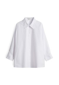 Witte lange mouwen blouse met een puntige kraag, ontspannen pasvorm en zichtbaar merketiket binnen in de hals.