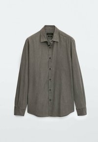 Overhemd met lange mouwen in gedempte grijze stof. Voorzien van een puntige kraag en een standaard voorpand met zes knopen. Soepele textuur.