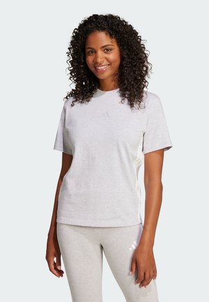Ljusgrå t-shirt med kort ärm i bomullsblandning, med rund halsringning, mjuk textur och diskret varumärke på bröstet och sidorna.