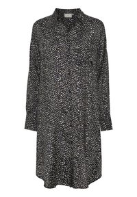 Robe noire à manches longues avec une coupe ample, un col, et un motif éparpillé blanc et beige sur un tissu texturé.