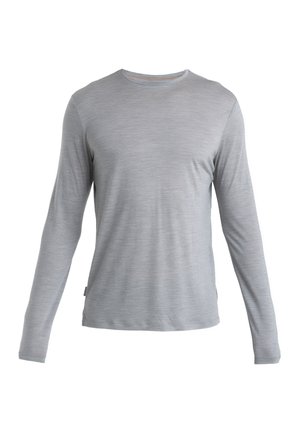Camicetta a maniche lunghe realizzata in un leggero e morbido tessuto grigio con scollo rotondo e una sottile texture. Presenta un'etichetta laterale.
