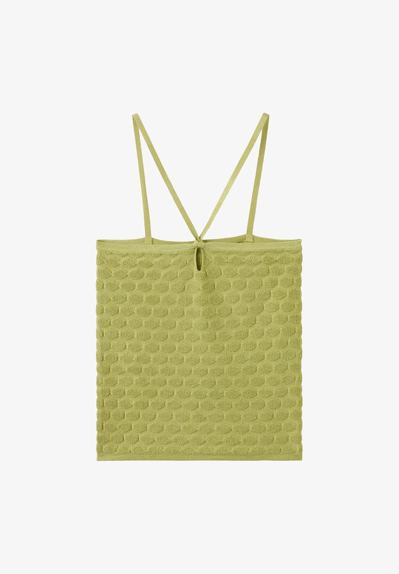 Haut sans manches texturé vert clair avec fines bretelles doubles croisées dans le dos et petit détail en forme de trou sous le décolleté.