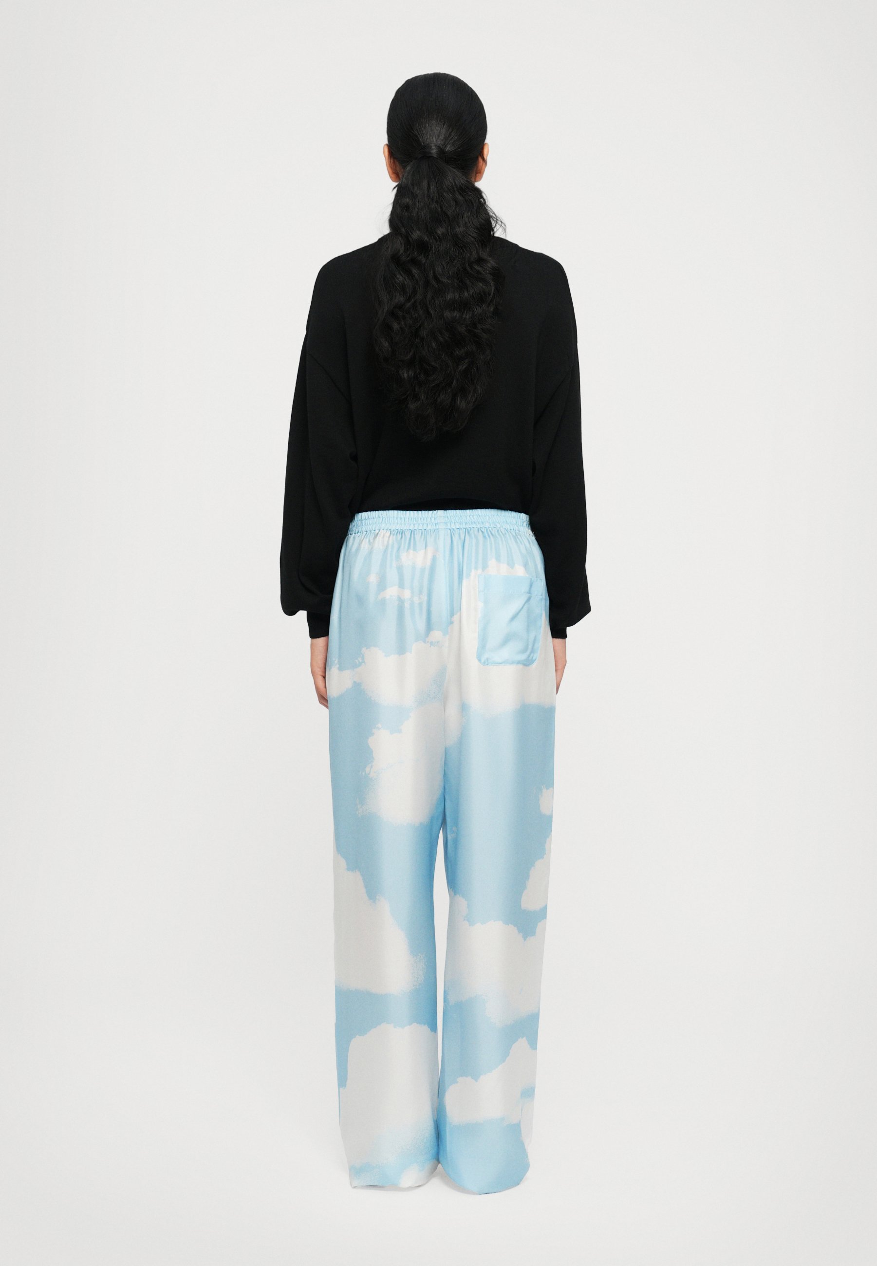 MOSCHINO ALL OVER CLOUD PRINT TROUSERS - Trousers - light