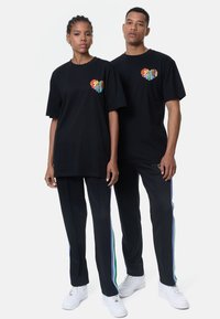 Karl Kani SMALL SIGNATURE STRAIGHT LEG TRACKPANTS UNISEX - Donji dijelovi trenirke - black