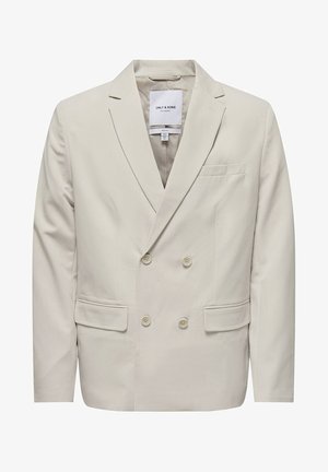 Helebeige kahe nööbiga bleiser siledast kangast. Omab kahte esist taskut ja kuut nööpi, ning sellel on nurgeline kraediil.