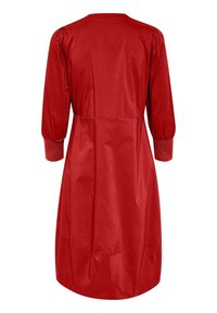 Vestito rosso con scollo rotondo e maniche lunghe. Il tessuto è liscio e presenta maniche a sbuffo con polsini elasticizzati. Design svasato all'orlo.