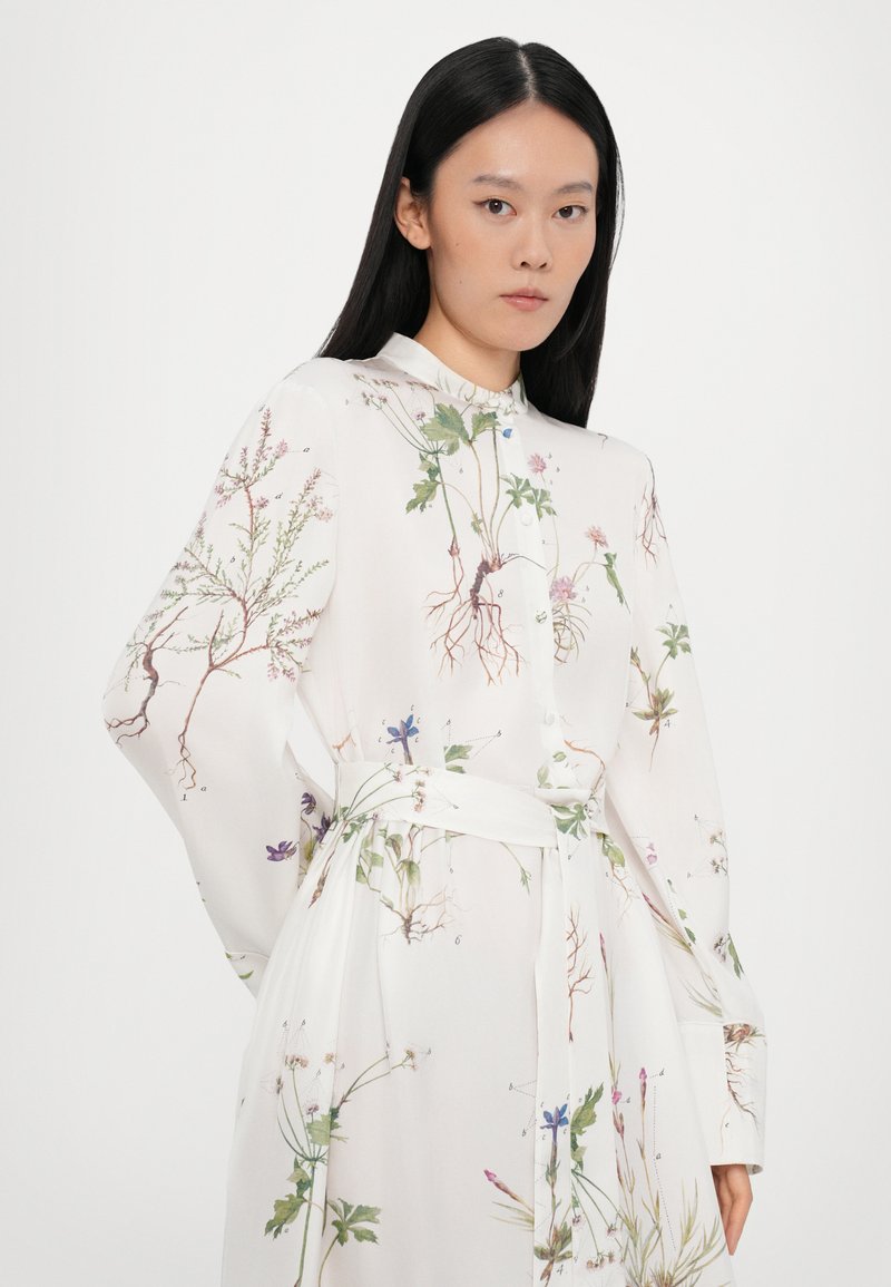 green patterned midi dress Green Polka Dot Tie Neck Midi Dress