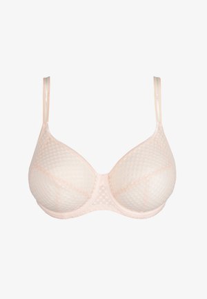 Rintaliivi vaaleanpunaisesta kankaasta, jossa on tekstuuriivinen, hunajakenno-kuvio. Varustettu ohuilla säädettävillä hihnoilla ja tukevalla langalla. Saumaojat ovat näkyvissä.