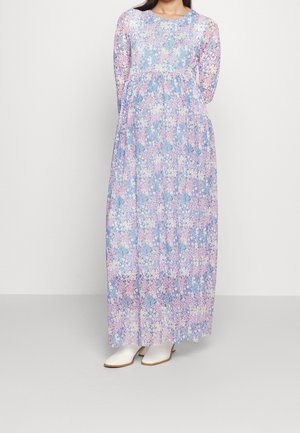 Maxi dress in floral print featuring pastel colors of purple, pink, and blue. Long sleeves and lightweight fabric with a fitted bodice.