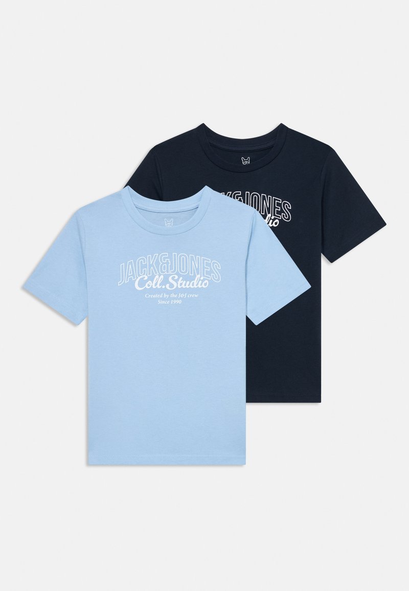 Two t-shirts: one light blue and one dark navy, both featuring the "JACK&JONES Coll. Studio" logo in white, made from soft cotton.