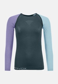 Long-sleeve shirt in dark gray, with one lavender and one light blue sleeve. Fabric appears smooth with subtle texture. Features logo at hem.