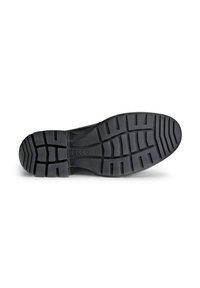 Semelle de chaussure en caoutchouc noir avec un motif de semelle. Comprend de multiples rainures pour une meilleure adhérence et un bout arrondi. Marque imprimée visible.