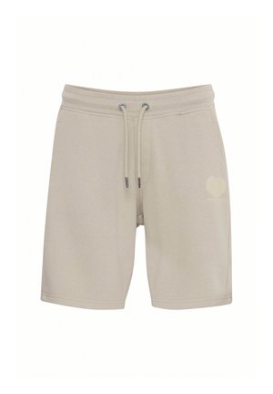 Beige bomuldsblandede shorts med elastisk talje, snøre og sidelommer. Har et diskret hjerte-logo på venstre lår.