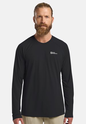 Zwarte longsleeve shirt gemaakt van lichtgewicht stof, met een ronde hals en het Jack Wolfskin-logo op de linkerkant van de borst.