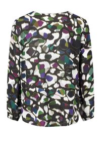 Langärmlige Bluse mit abstraktem mehrfarbigem Muster in Grün, Lila, Blau, Braun und Weiß auf einem schwarzen Hintergrund.