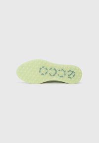 Sola de sapato de borracha verde-claro com padrão em diamante, superfície texturizada e nome da marca em relevo em design circular.