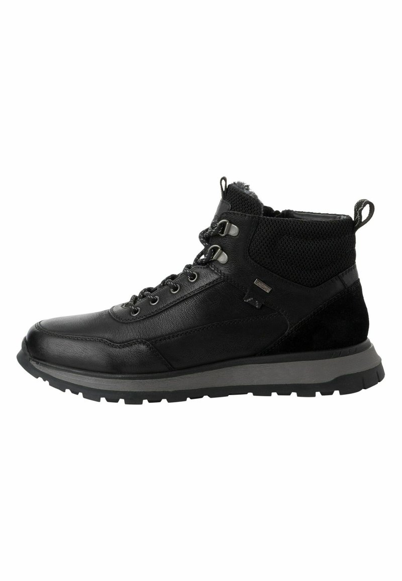 Schwarze Wanderschuhe mit einer Kombination aus Leder und Mesh-Material, einer gepolsterten Knöchelpartie und einer langlebigen Gummisohle.