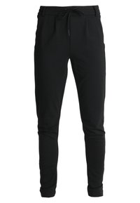 Pantaloni della tuta neri, slim-fit, con vita elasticizzata e cordoncino. Realizzati in tessuto morbido, presentano tasche laterali e design con gamba affusolata.