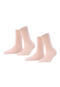 Beige cotton blend socks, two pairs. One crew length with a ribbed top, one ankle length. Smooth texture, seamless toe design.