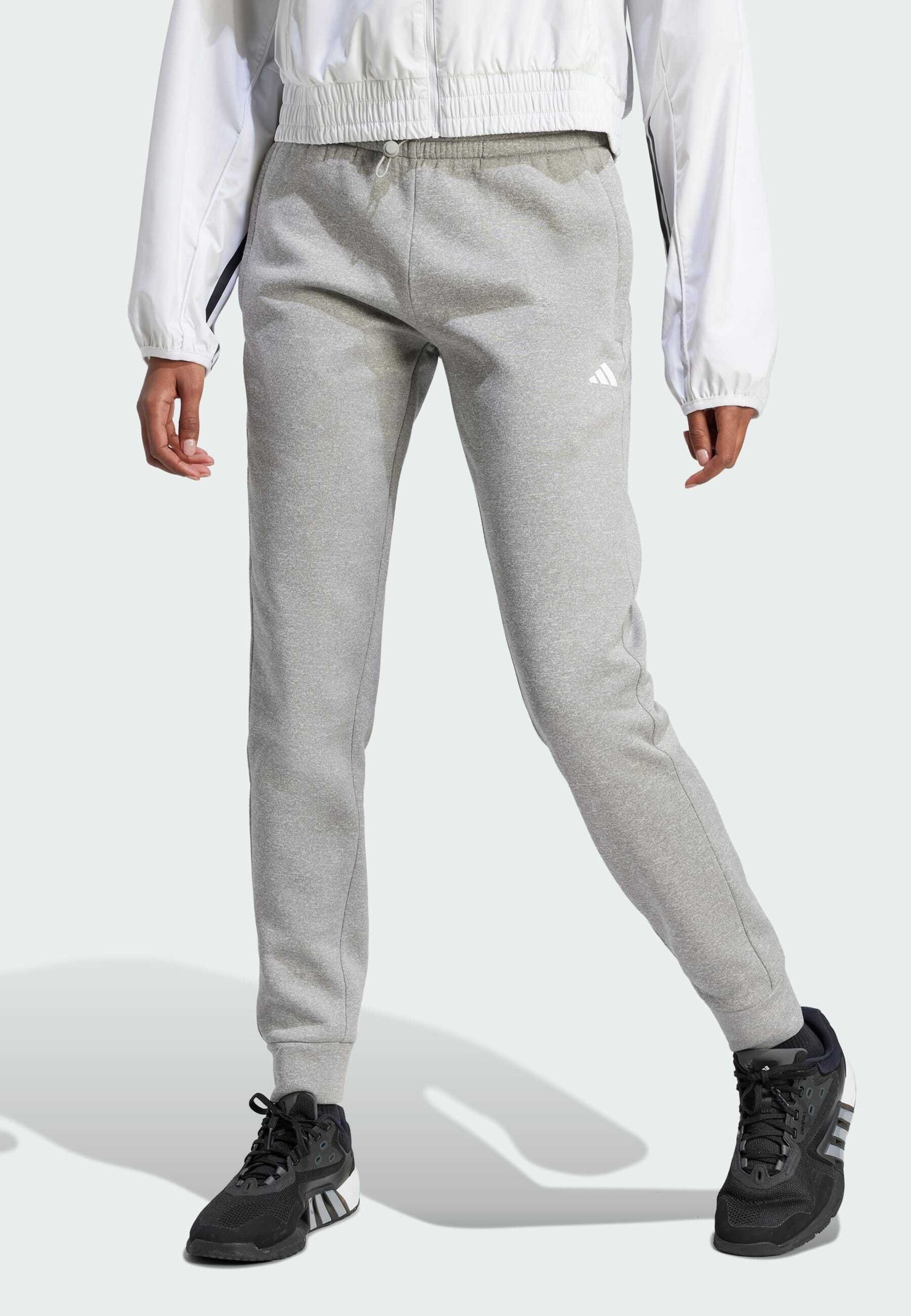grey adidas joggers with black stripes