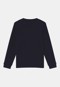 Felpa blu navy con scollatura rotonda e maniche lunghe. Realizzata in tessuto morbido, presenta polsini e orlo a coste con una texture liscia.