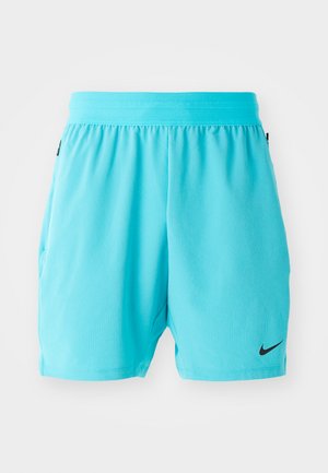 Turquoise athletic shorts with an elastic waistband, side pockets, ribbed texture, and a small black Nike logo on the lower left side.