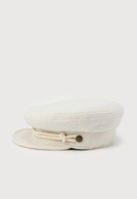 Off-white textured fabric captain's hat with a braided cord and a small decorative bronze button on the front.