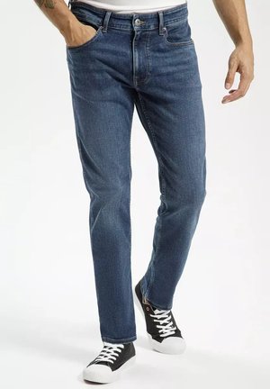 - Jeansy Slim Fit