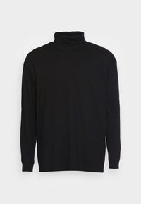 Czarny longsleeve golf wykonany z miękkiego materiału. Posiada dopasowany kołnierz i luźny krój z mankietami.