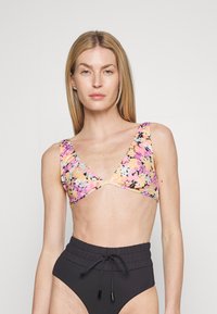 Ziedu bikini augšdaļa ar V veida dekoltē, ar rozā, oranžām un melnām rakstzīmēm, kombinēta ar augsto vidukļa melnu apakšdaļu.