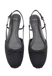 Black fabric slingback shoes with a rounded toe, featuring a small bow detail and thin straps. Smooth sole with a glossy finish.