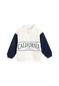 Sweatshirt blanc et marine avec un col zippé à moitié, présentant l'inscription "CALIFORNIA 1982 LOS ANGELES" imprimée sur le devant en lettres majuscules.
