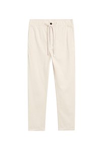 Pantaloni in cotone leggeri beige con vita regolabile, tasche frontali e chiusura a bottone, caratterizzati da una texture liscia.
