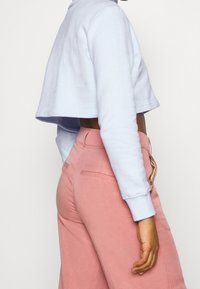 Monki Felpa - light blue