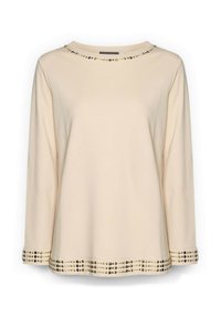 Maglietta beige a maniche lunghe con scollatura rotonda, caratterizzata da dettagli dorati lungo il collo e l'orlo, realizzata in un tessuto morbido.