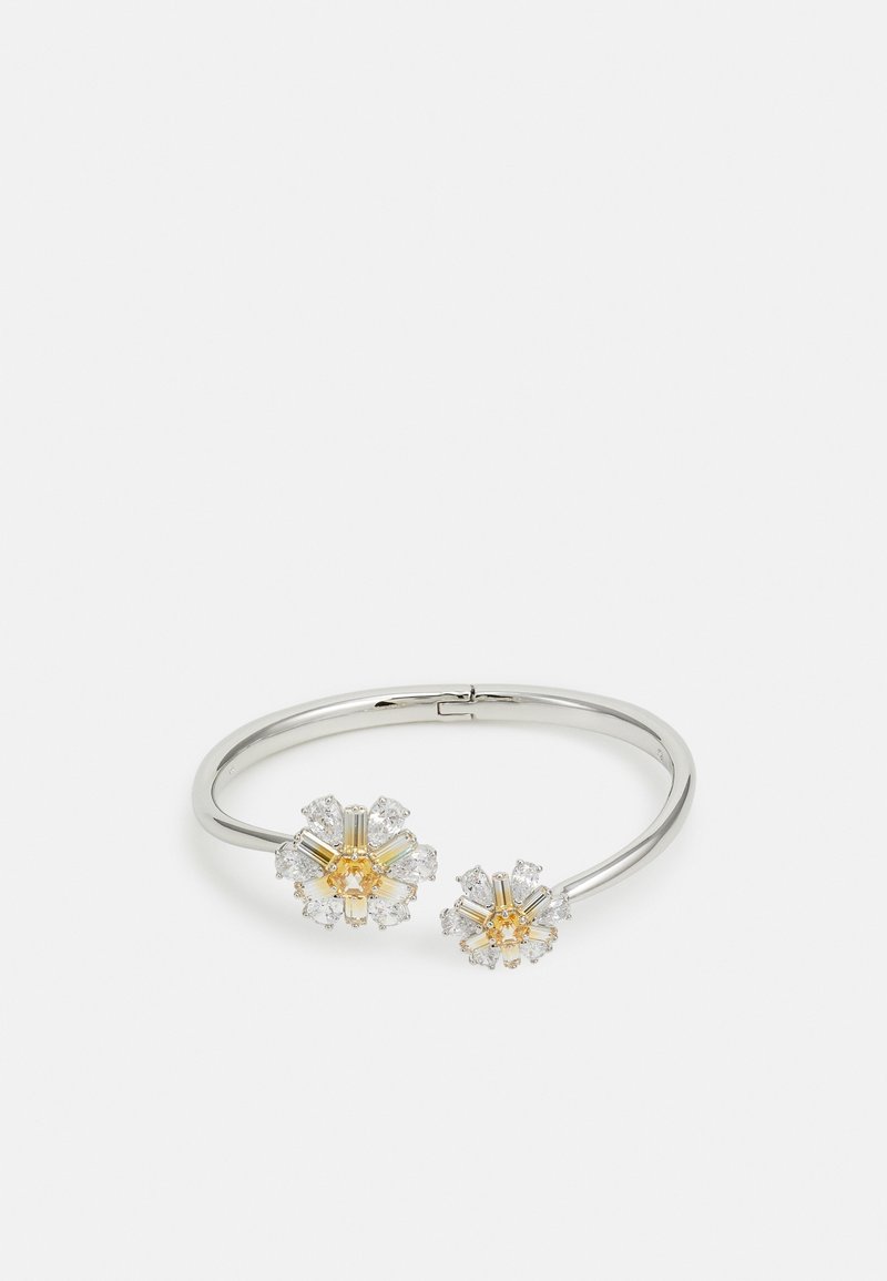 Bracelet jonc ouvert en argent avec deux extrémités en forme de fleur ornées de pierres précieuses jaunes et transparentes sur fond blanc.