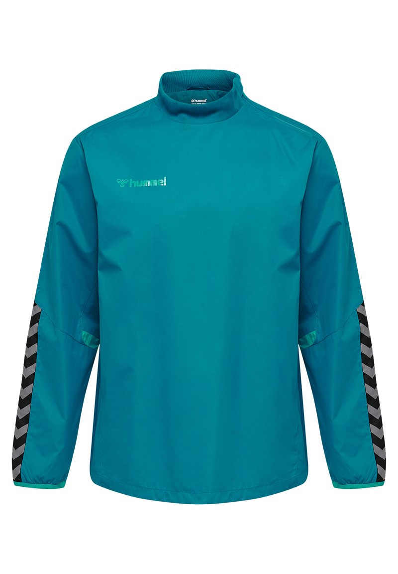 Teal windbreaker met een hoge kraag, voorzien van een subtiel logo en diagonale zwart-grijze chevronpatronen op de mouwen. Lichtgewicht materiaal.